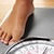 standing on a scale