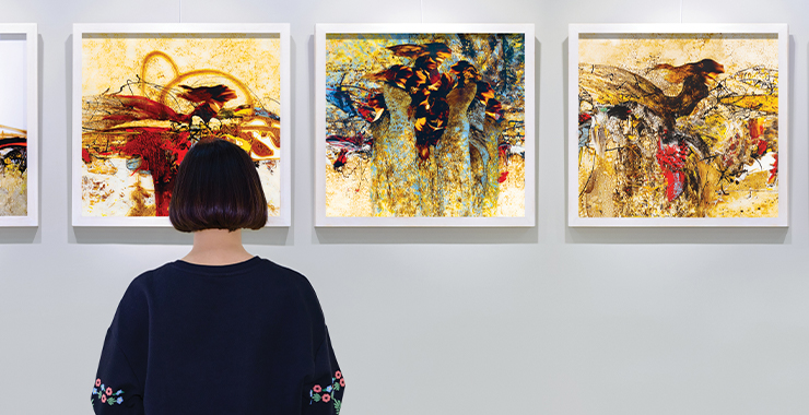 Woman admiring art in a gallery