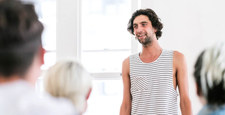 Monitor on Psychology: June; man talking to a recovery group