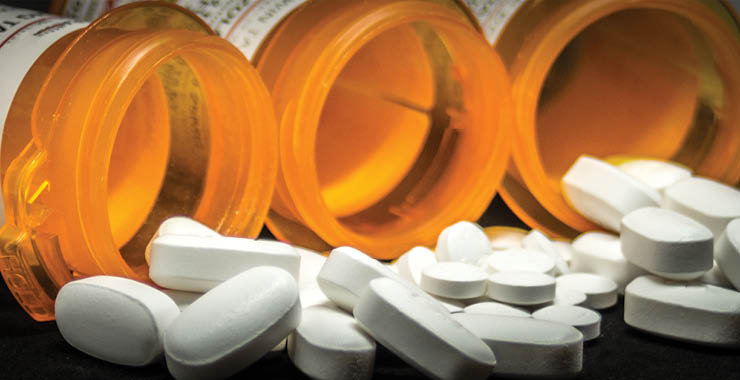 Monitor on Psychology: June; open pill bottle