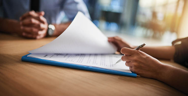 Monitor on Psychology: June; person reviewing paperwork