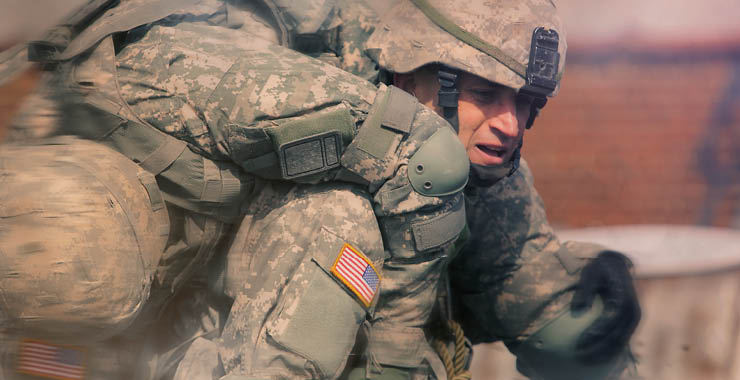 Monitor on Psychology: June; soldier carrying another soldier