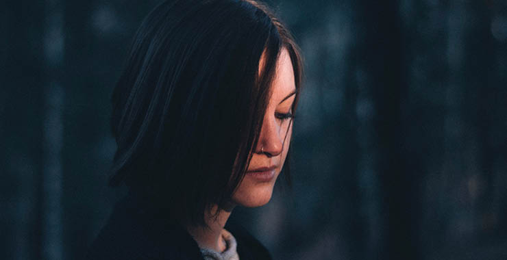 Monitor on Psychology: June; young adult looking down