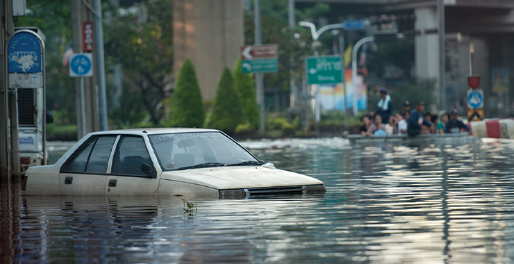 car on flooded street