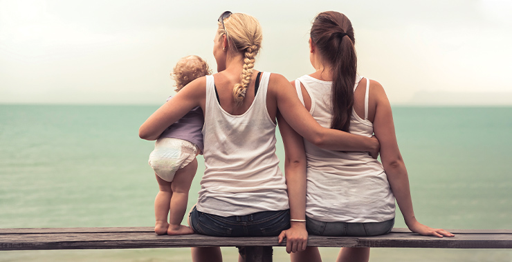 same sex couple and a baby