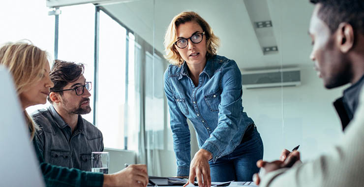 Woman leading a business meeting