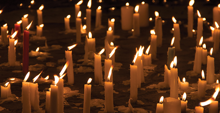 Field of lit candles