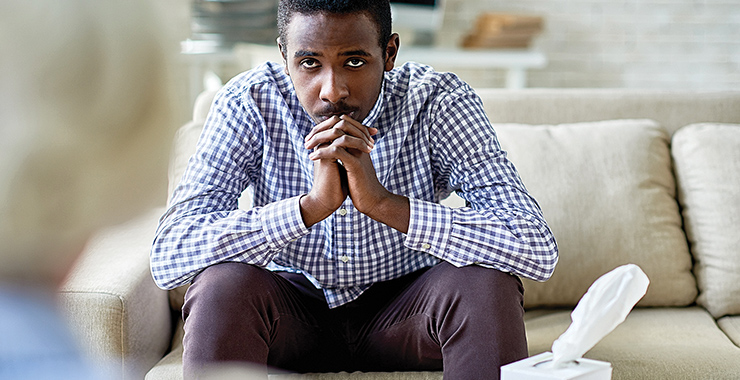 Psychologist listening to a client