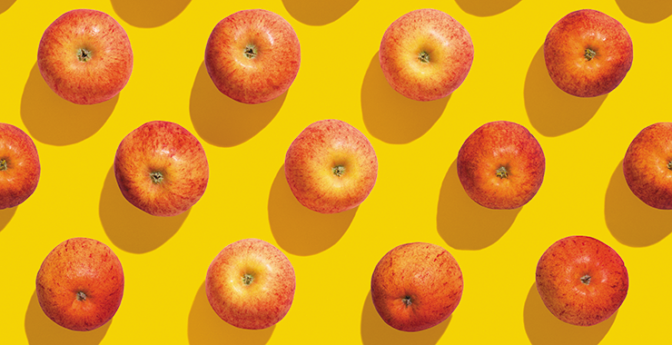 Group of apples spaced equally apart