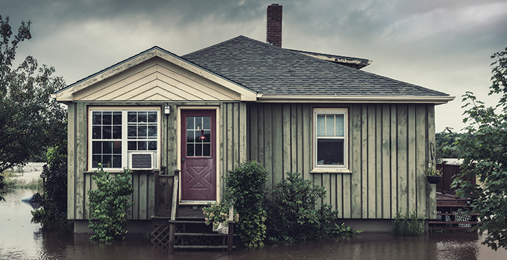 House surrounded by flood water