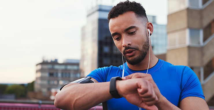 Runner utilizing a GPS watch
