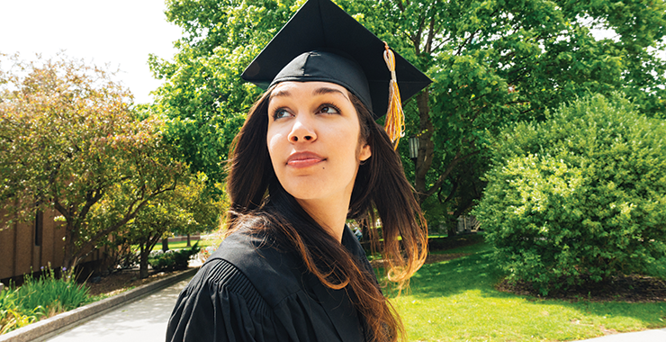 New graduate with cap and gown