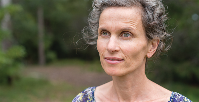 smiling older woman with gray hair