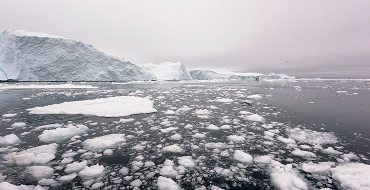 desolate area of melting icebergs and water