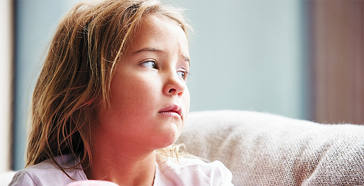 Young girl looking sad