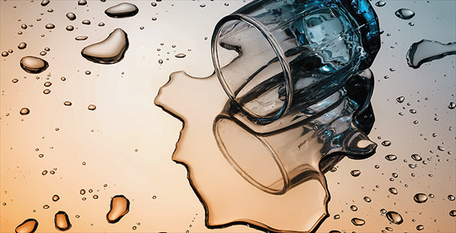 overturned glass of alcohol