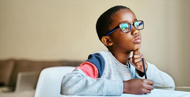 boy working on school work