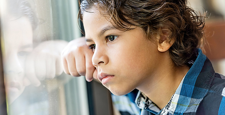 small boy with pensive look
