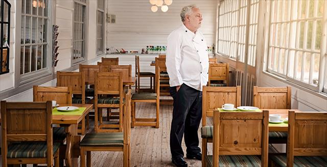 chef standing in his restaurant