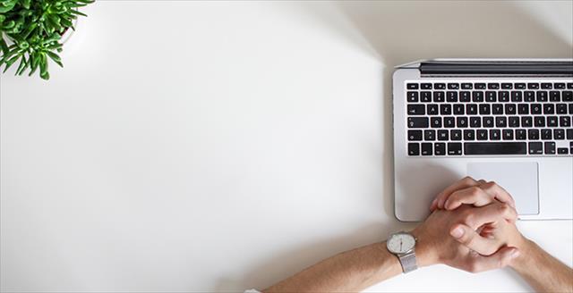 graphic of a woman in front of a laptop