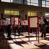 people voting at a polling station