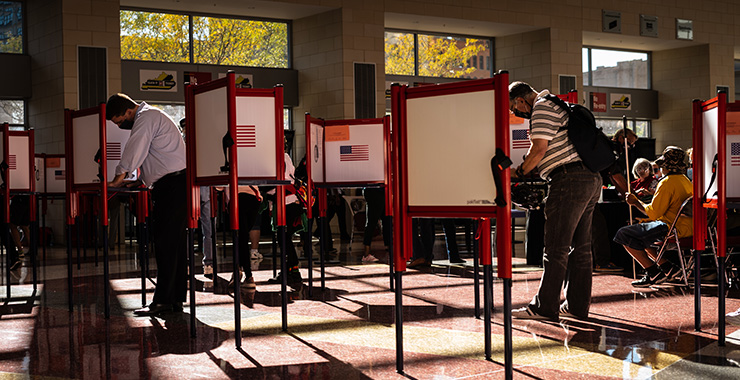 people voting at a polling station