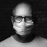man with glasses wearing a nonmedical mask
