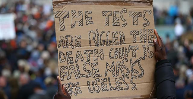 handwritten sign on cardboard