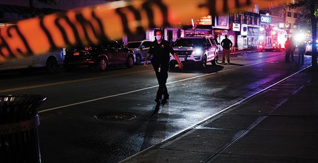law enforcement officer walking down the street
