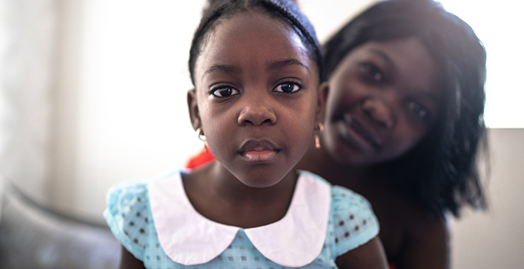 woman of color with her young daughter