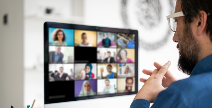 Man looking at Zoom call screen