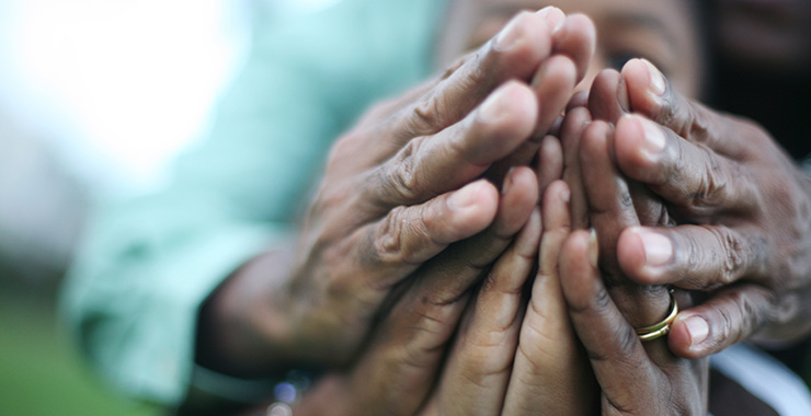 interlocking hands of color