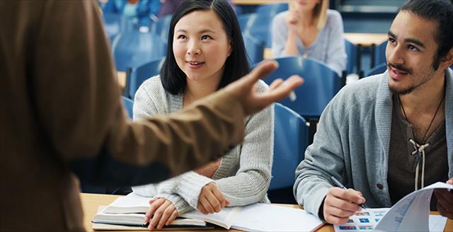 young adults in a college classroom