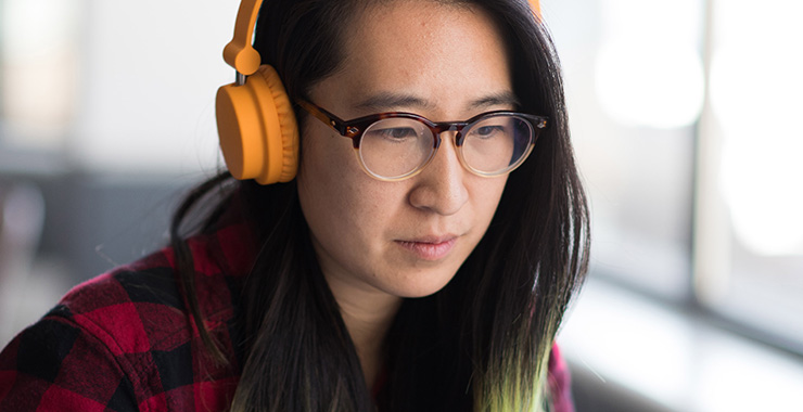 woman listening with headphones