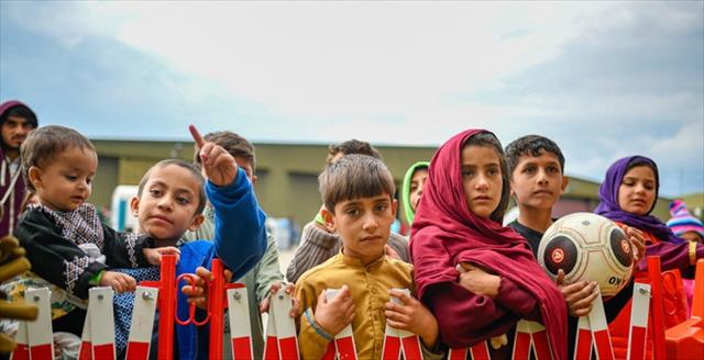 Refugees from Afghanistan seen at a temporary camp at the U.S.