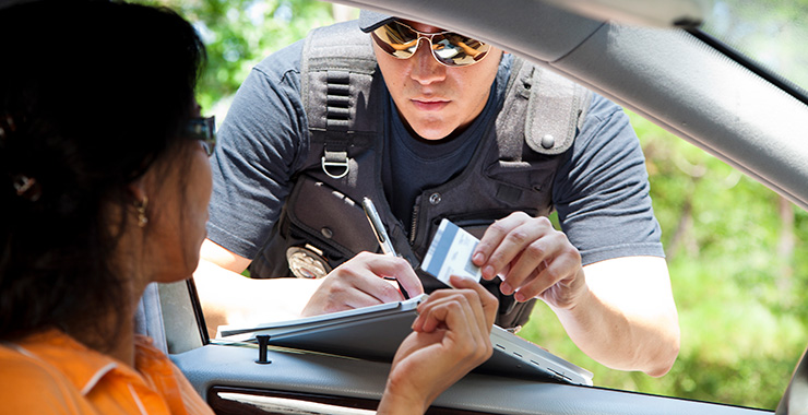 police officer writing a citation