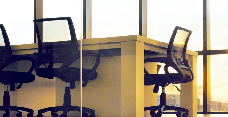 empty chairs in a boardroom