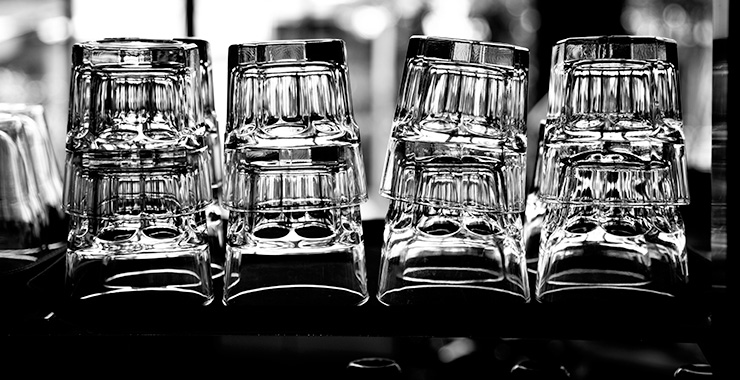 stack of clear drinking glasses