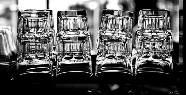 stack of clear drinking glasses