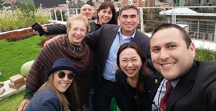 group of people smiling and posing for a picture