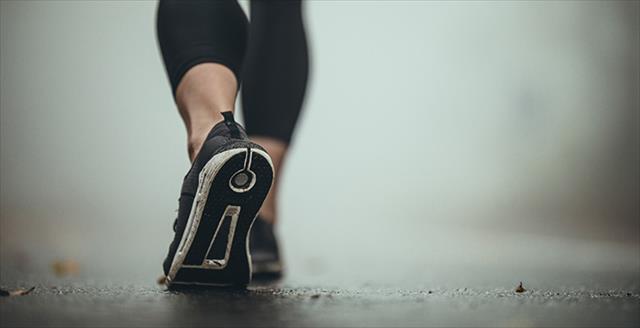 woman wearing tights and running shoes
