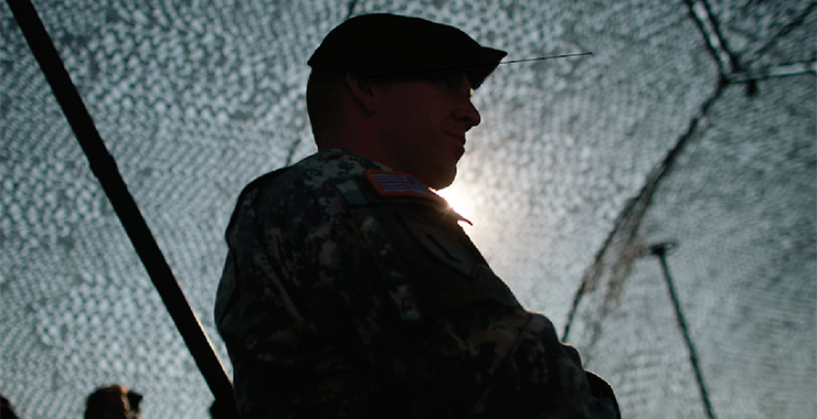 profile of a soldier standing outside