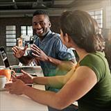 young adults having a discussion over coffee