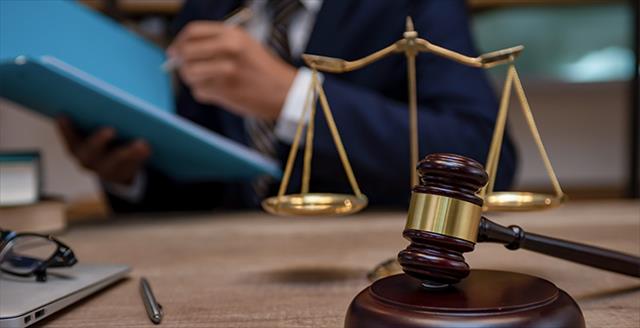 gavel and scales of justice on a desk