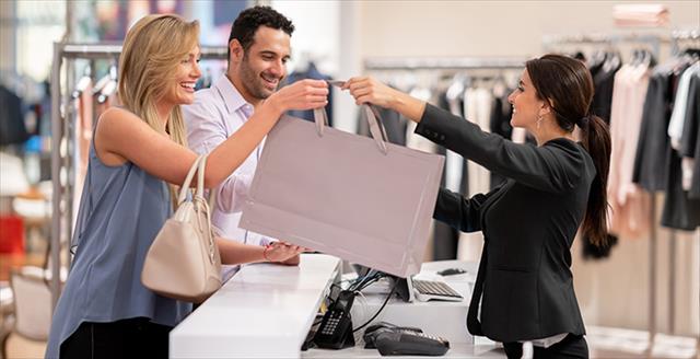 couple at a check out counter