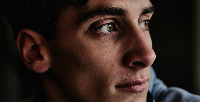close up of face of teenage boy