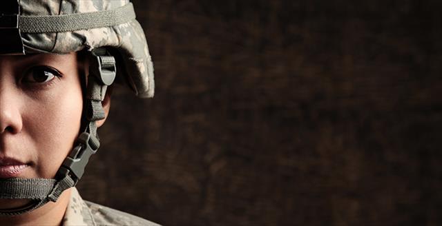 woman wearing military helmet and uniform