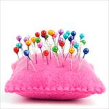 pin cushion with several straight pins
