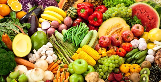 several varieties of fresh vegetables and fruits