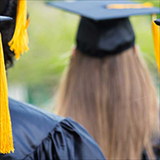 students wearing graduation caps